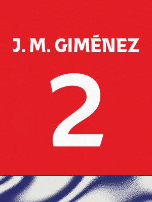 Dorsal de color rojo con el nombre 'J. M. Giménez y el número 2 en blanco, sobre un borde inferior con patrón ondulado azul y blanco.